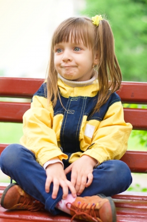 little cute girl at the parkの写真素材