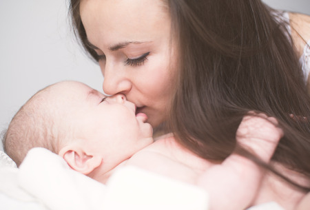 Happy Mother and her Newborn Baby.の写真素材