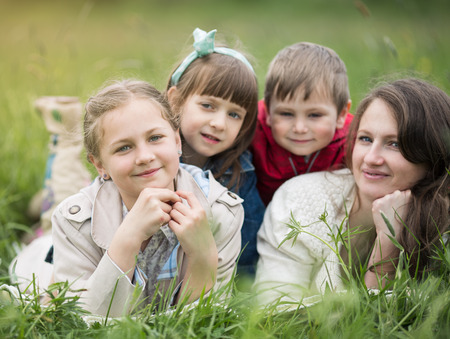 closeup summer portrait of happy Family  relaxing in countrysideの写真素材