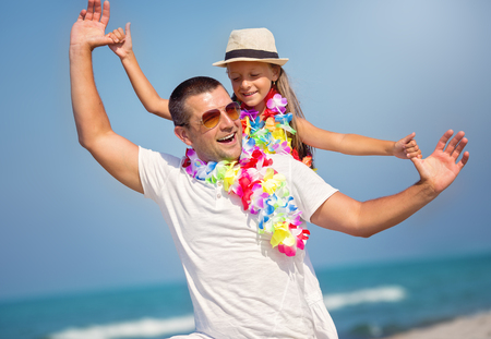 Summer, family, vacation concept. Father with daughter having funの写真素材