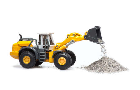 The toy heavy bulldozer on a white background