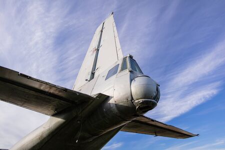 old abandoned propeller plane against the sky