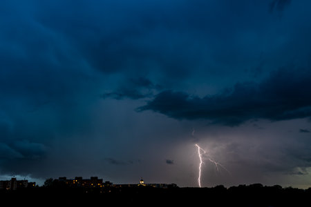 night thunderstorm. thunderclouds illuminated by flashes of lightning at night