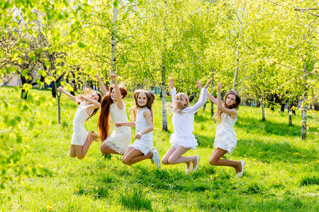 Portrait of happy children on nature in summerの写真素材