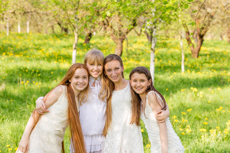 Portrait of happy children on nature in summerの写真素材