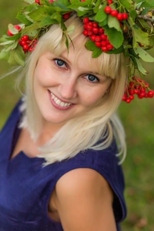 Portrait of a beautiful little girl with blond hairの写真素材