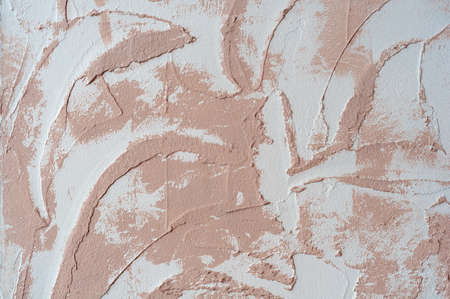 Sloppy brush strokes texture of decorative plaster on the wallの写真素材