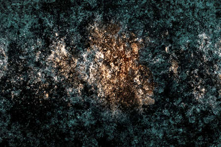 high contrast pearlescent abstraction texture with a light spot in the middle. high contrast abstraction rough with pearlescent tint and light spot in the centerの写真素材