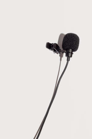Lavalier wired microphone with clothespin vertical isolate on white backgroundの写真素材