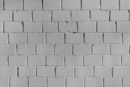 stone block gray wall texture. gray stone background evenly litの写真素材