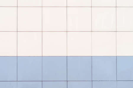 background from decorative facade tiles dark bottom light top
