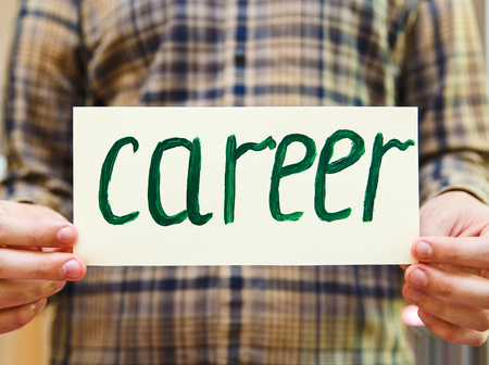 Painting stroke sketch.Male's hands holds a cardboard sign. Careerの写真素材