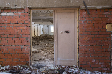 Abandoned place. The ruins of old crushed buildingの写真素材