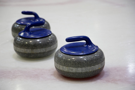 The stones for game in curling on iceの写真素材