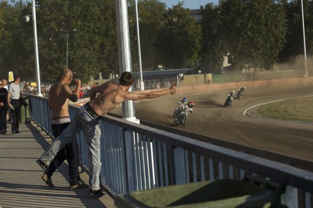 DAUGAVPILS, LATVIA - AUGUST 23, 2015: Speedway rider on the track. Match of Speedway polish league NICE Lokomotiv - ROW 54:35のeditorial素材