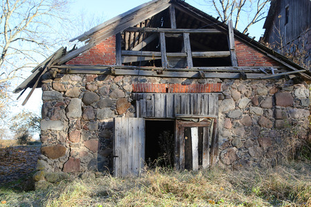 Abandoned stone building with the collapse of the roofの写真素材