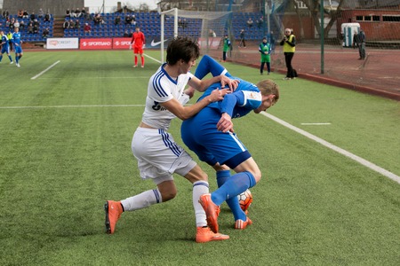 DAUGAVPILS, LATVIA - April 3, 2016: Episode of football match in Daugavpils. Latvian championship high league. BFC Daugavpils - RFS 1:0のeditorial素材