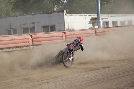 DAUGAVPILS, LATVIA - June 5, 2016: Speedway riders on the track in match of polish NICE league Lokomotiv - Orel 42:47のeditorial素材