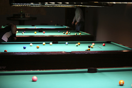 Pool balls on green pool table and background of billiard tablesの写真素材