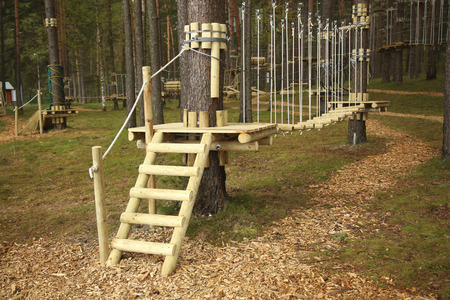 Hanging trails in the adventure park. Obstacle courseの写真素材
