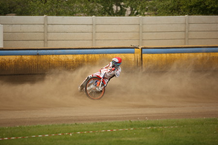 DAUGAVPILS, LATVIA -June 4, 2017: Speedway riders on the track in match of polish NICE league Lokomotiv - Krakowのeditorial素材