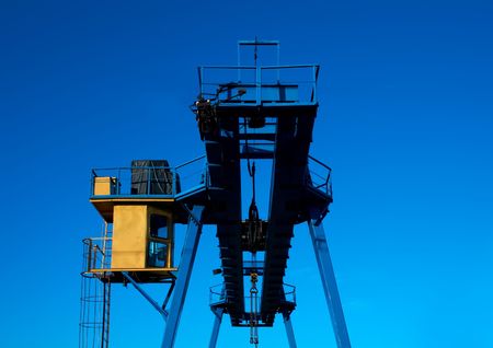 crane against a backdrop of blue skyの写真素材