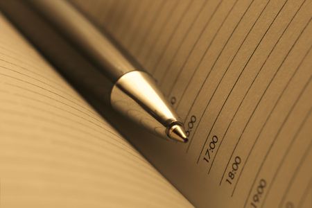 pen and notebook close-upの写真素材