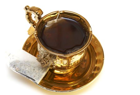 packet tea in the gold cupの写真素材