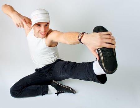 Young man break dancer standing in pose.の写真素材