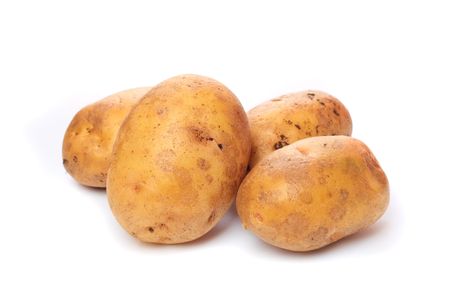 raw potato on a white backgroundの写真素材