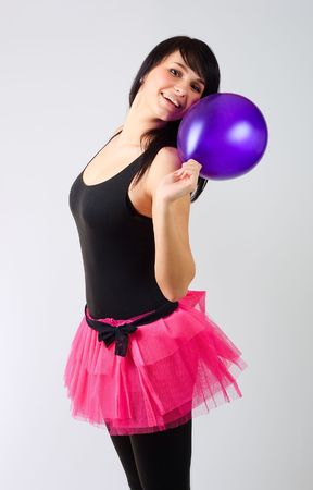 Girl with a purple balloonの写真素材