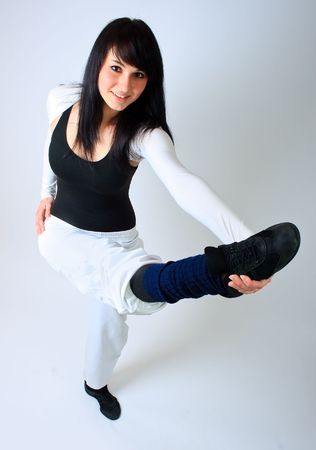 Girl dancer in black and white suitの写真素材