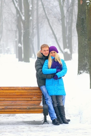 Young adult couple in the park. Winter.の写真素材