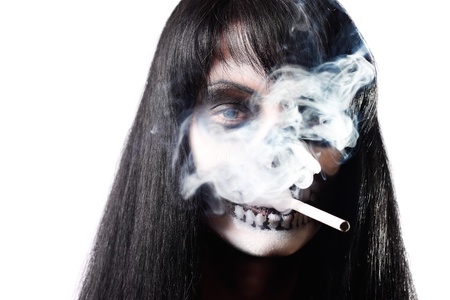 Gothic portrait of dead woman with cigaretteの写真素材