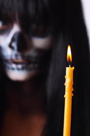 Gothic portrait of dead woman with candleの写真素材
