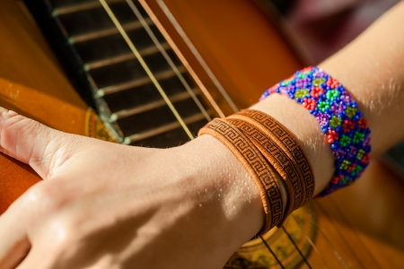 Hand hippie girl with guitarの写真素材