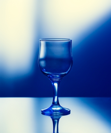 Glass on blue backgroundの写真素材