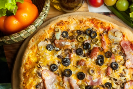 Italian pizza with ingredientsの写真素材