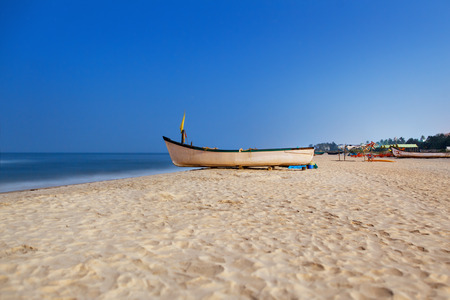 Boat on beach at nightの写真素材
