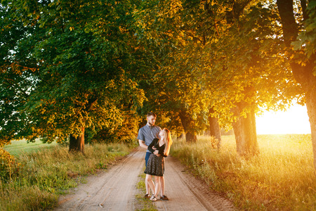 Romantic love story. Young couple at sunsetの写真素材