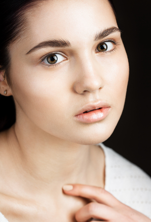 Woman face portrait, young lady studio shotの写真素材