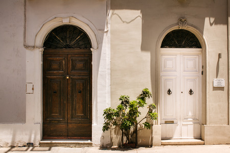 Old windows doors and balconies on Maltaの写真素材