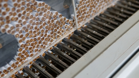 Cigarettes production line in a tobacco inductry factoryの写真素材