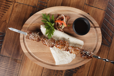 barbecue pork with salad, pita bread and sauce.の写真素材