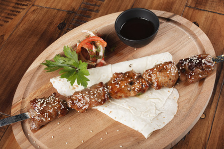 barbecue pork with salad, pita bread and sauce.の写真素材