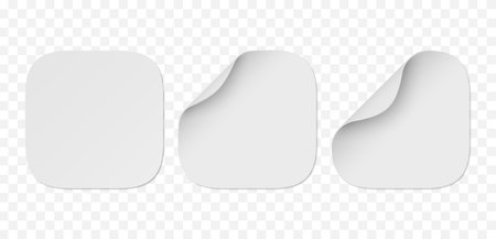 Vector set of white paper squircle stickers isolated on transparent background. Realistic square stickers curved with white corner and soft shadows.のイラスト素材