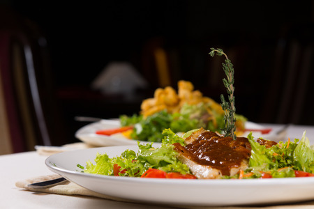 Close up Macro Tasty Healthy Recipe on White Round Plate Served on the Table.の写真素材