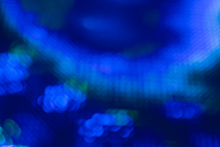 Lights Behind Blue Transparent Glass in Diffused Effect, Emphasizing Copy Space