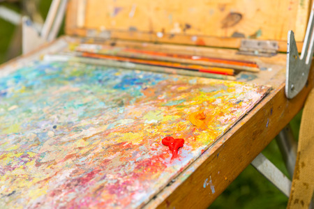 Open Sketchbook With Set Of Brushes And Multicolor Paletteの写真素材