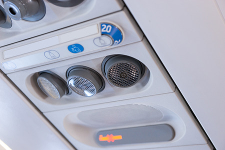 Overhead console in the modern passenger planeの写真素材